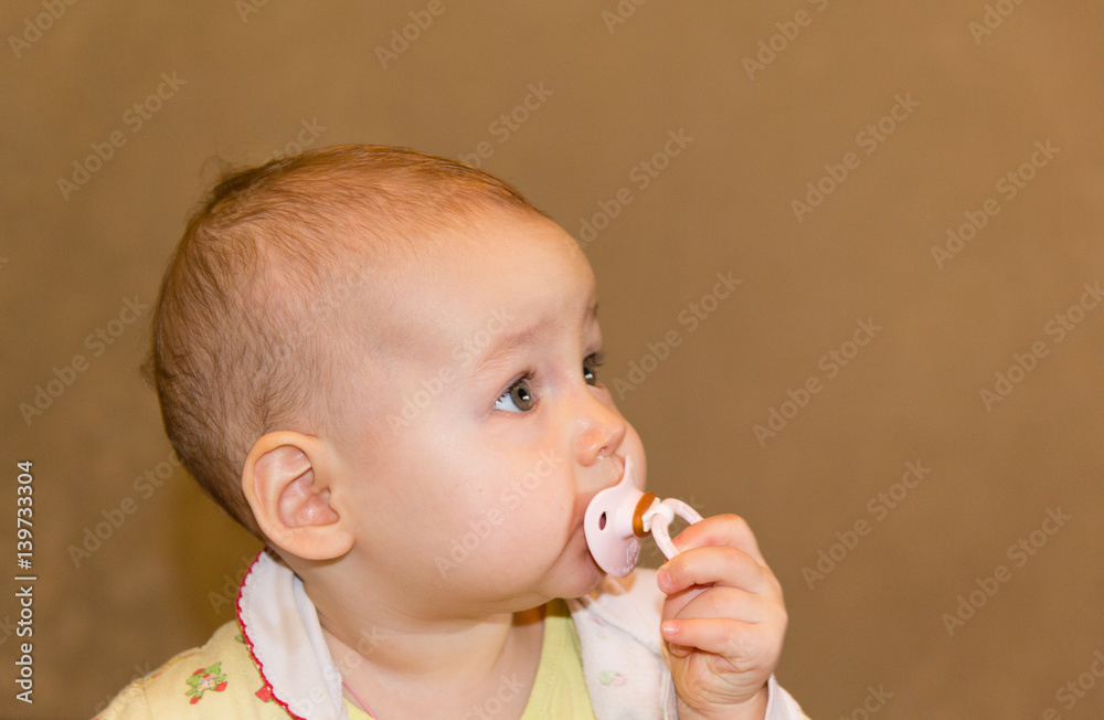 Portrait of a cute baby with a pacifier Portrait of a cute baby with a pacifier