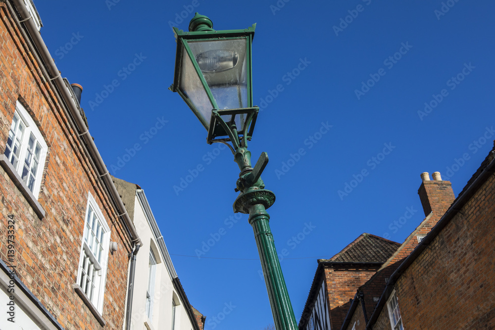 Leaning Lamp Post on Steep Hill in Lincoln