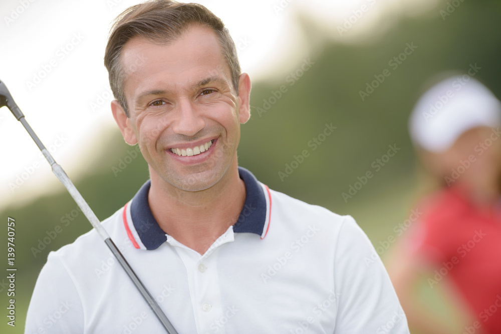 golfer smiling for endorsement StockFoto Adobe Stock