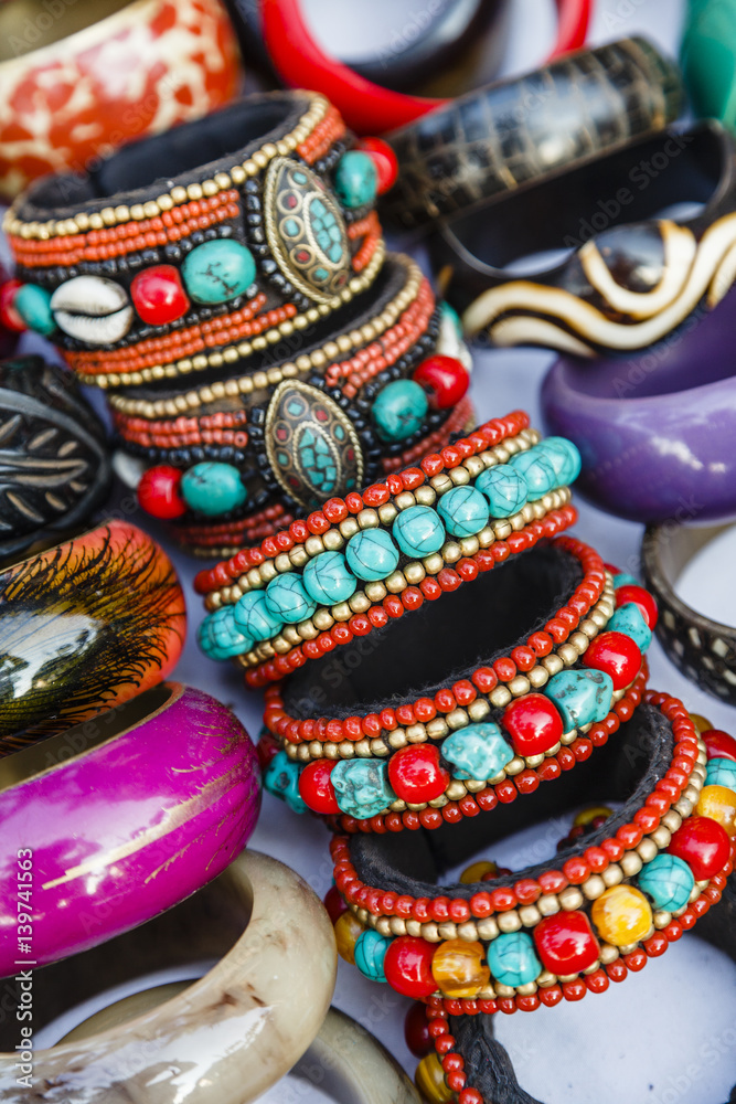 Detail of bracelets and rings at the Tibetan Market in Wednesday Flea Market in Anjuna, Goa, India. Detail of bracelets and rings at the Tibetan Market in Wednesday Flea Market in Anjuna, Goa, India.