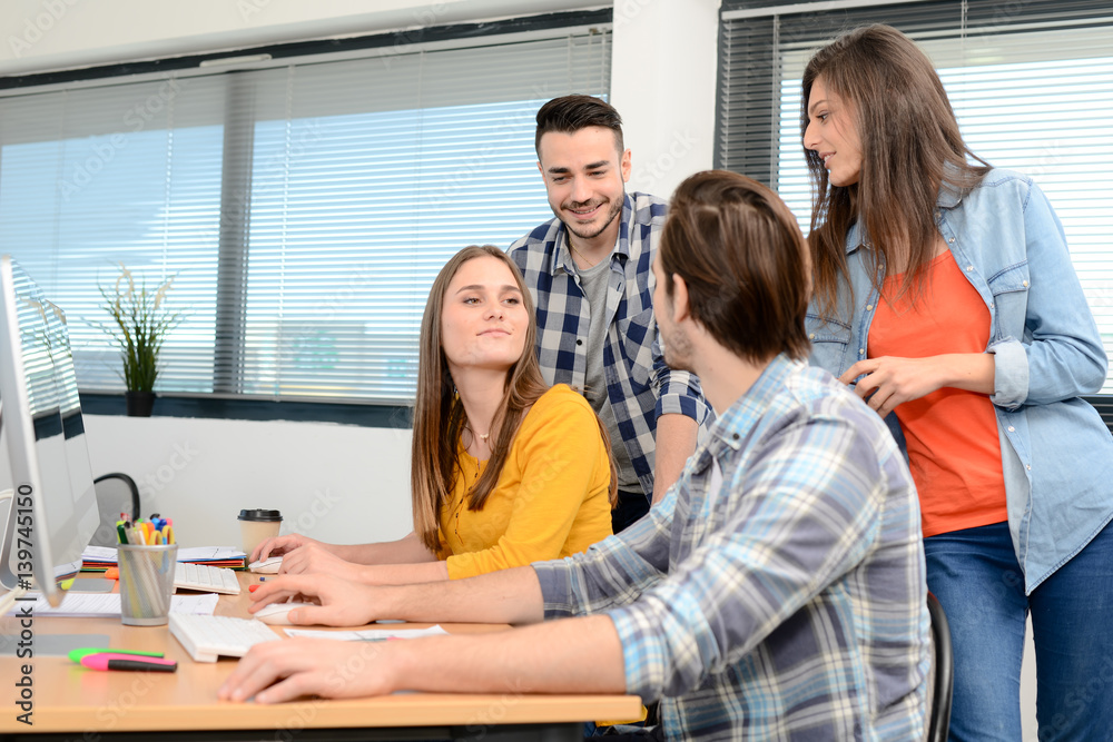 Obraz premium group of young cool hipster creative business people in casual wear working together in meeting room of a startup company
