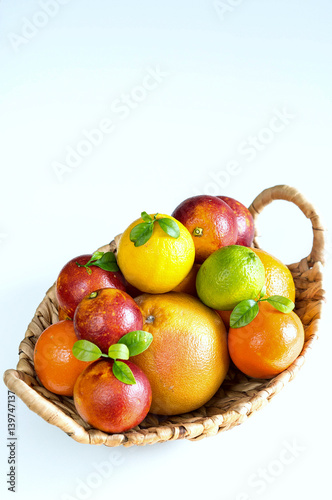 Fototapeta Naklejka Na Ścianę i Meble -  Fruit basket on white background