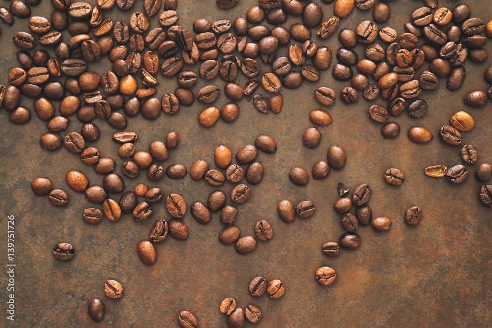 Coffee beans on stone table/coffee background Coffee beans on stone table/coffee background
