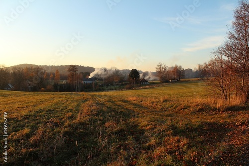 Look at the landscape of the village and the church in the Czech Republic