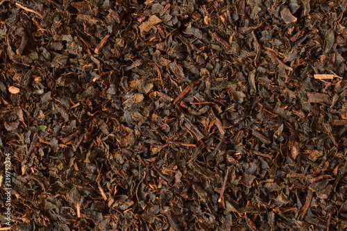 dry black tea leaves texture background