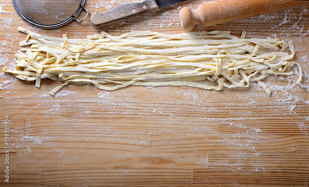 Fresh homemade pasta. Noodles. Durum wheat pasta. Ingredients: durum wheat  semolina, manitoba flour, water, salt. Top view, space for text. Stock  Photo | Adobe Stock