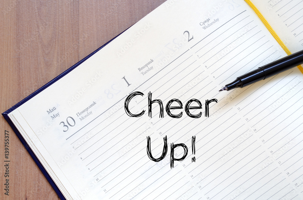 Cheer up concept on notebook Cheer up concept on notebook