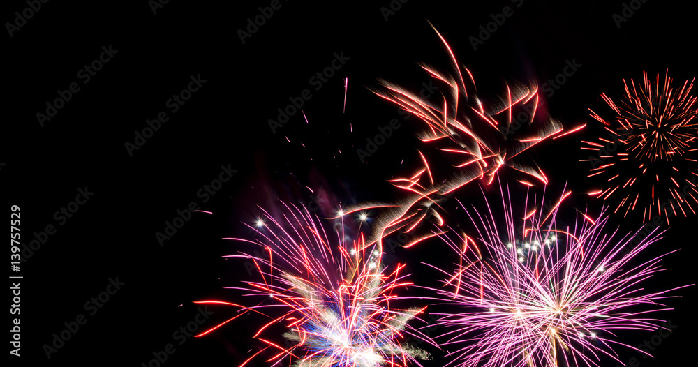 red and fuchsia fireworks with copy space