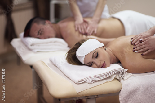 couple receiving a back massage