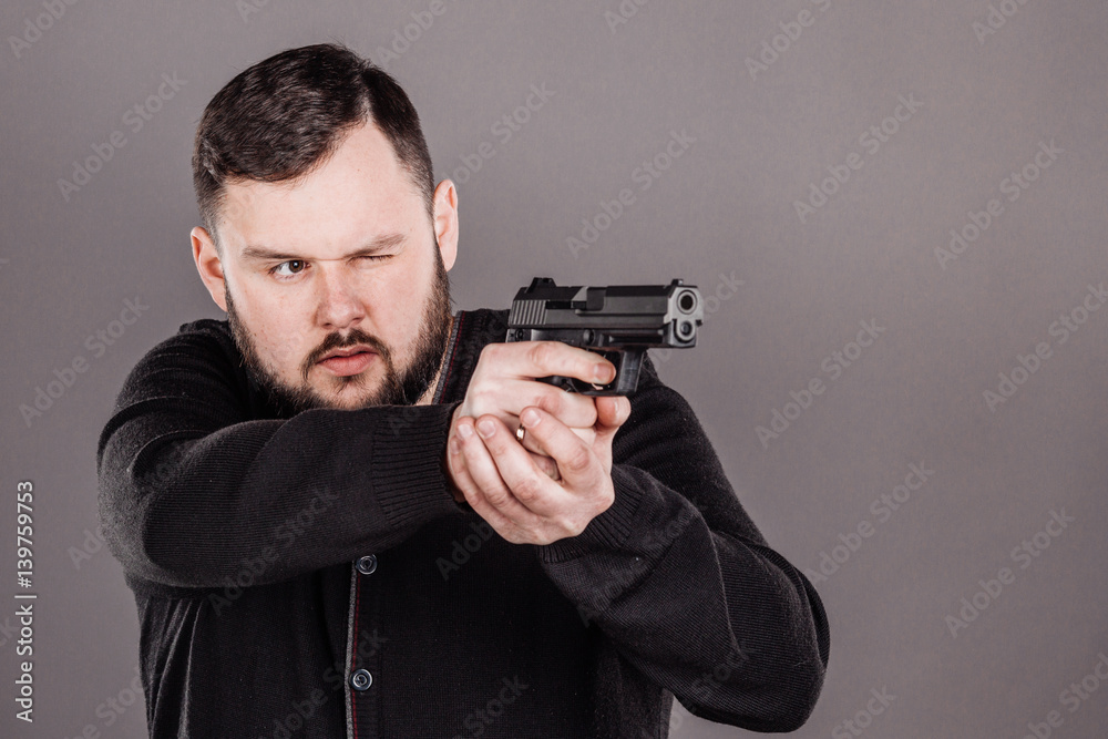 man with pistol. dangerous and criminal concept man with pistol. dangerous and criminal concept