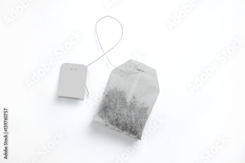 Teabag with grey label. Top view. Isolated on a white. mockup