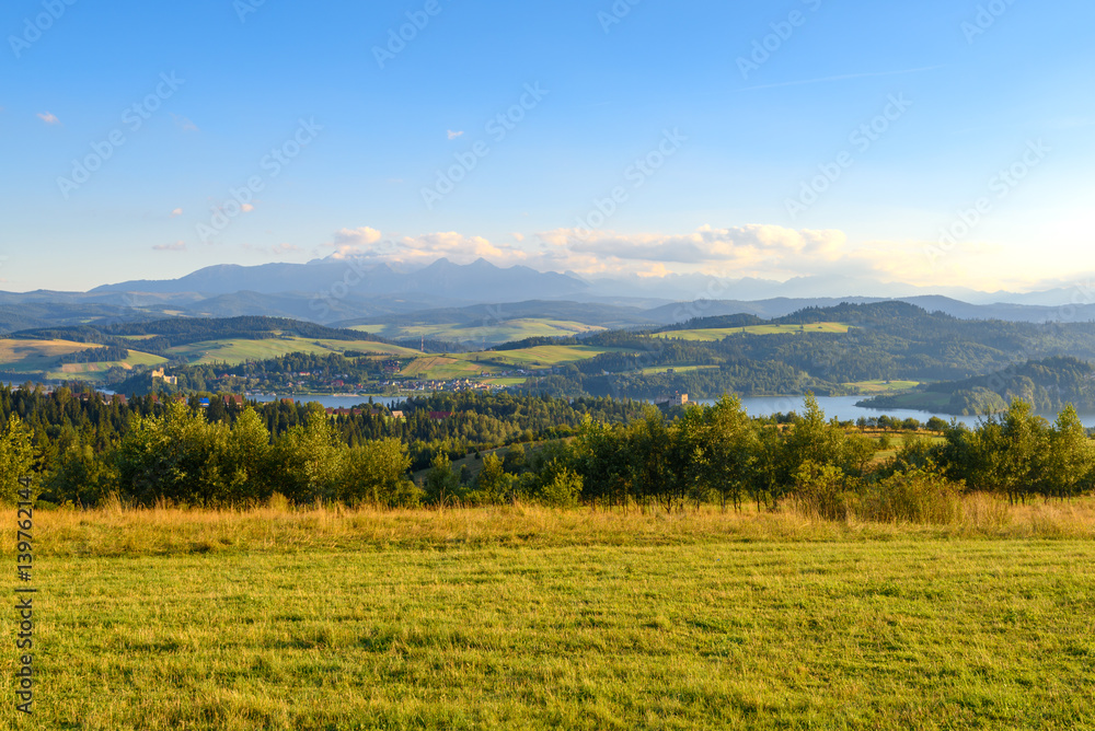 Beautiful Czorsztyn Lake and Tatra mountains in background. Malopolska. Poland.