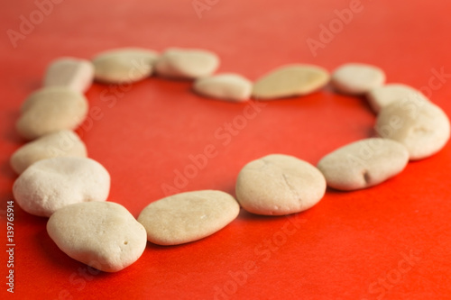 red heart with white stones