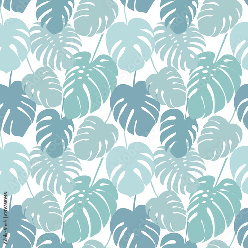 Seamless pattern with tropical monstera leaves.