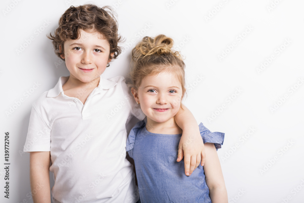 Happy Brother and Sister Hugging each other Happy Brother and Sister Hugging each other