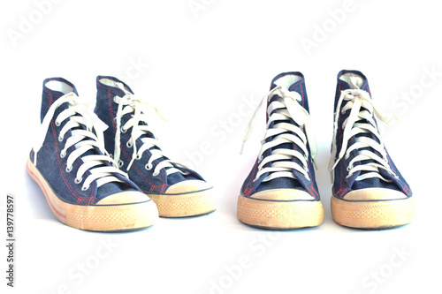 Jeans sneakers on white background