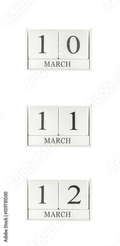 Closeup group of white wooden calendar with black 10 , 11 , 12 march word , three date calendar isolated on white background