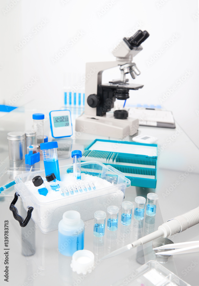 Science background with microscopic work station