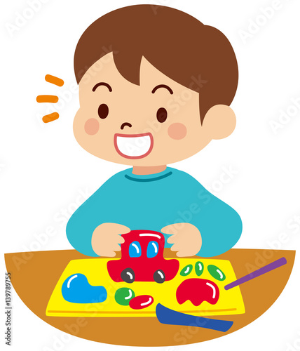 ねんど遊びをする子供