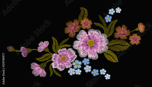 Delicate pink rose and buds on a black background