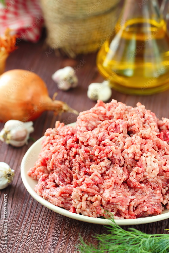 Raw minced beef in a bowl Raw minced beef in a bowl