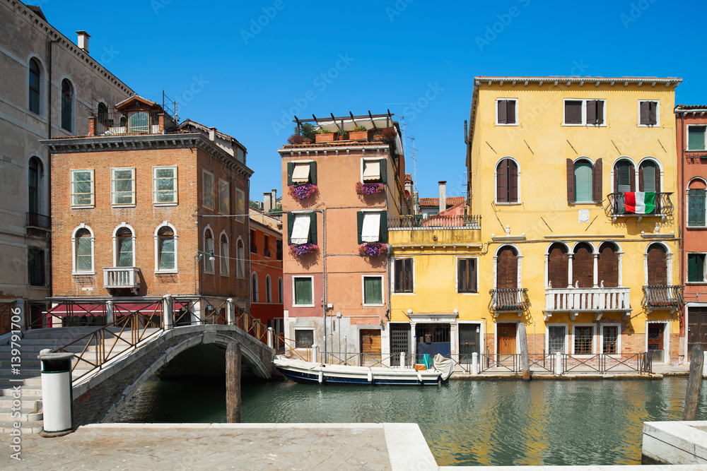 Old houses and bridge over Canal De Cannaregio in Venice