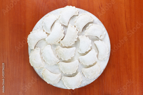 Cooking dumplings, vareniki before boiling. Traditional Ukrainian food