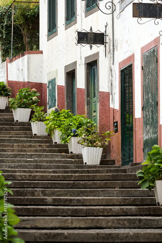 Steep stairs decorated with flowers in Sao Vincente. Madeira. Portugal