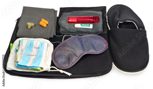 Travel Kit: map, earplugs, eye band for sleeping, socks, inflatable pillow, toothbrush and toothpaste.