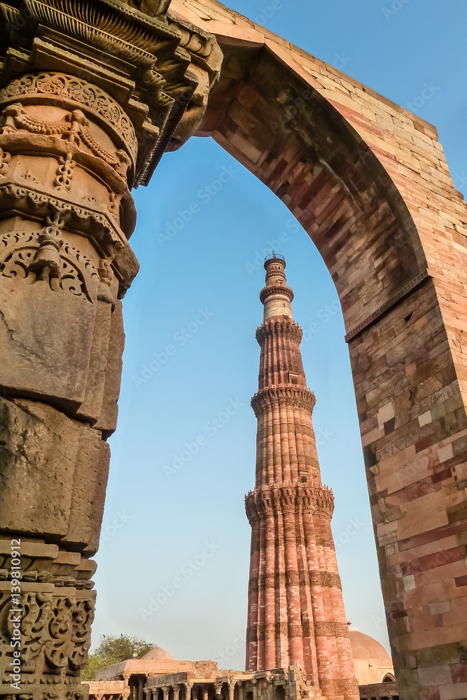 View of Qutb Minar through an arch, Qutb complex, Delhi, India