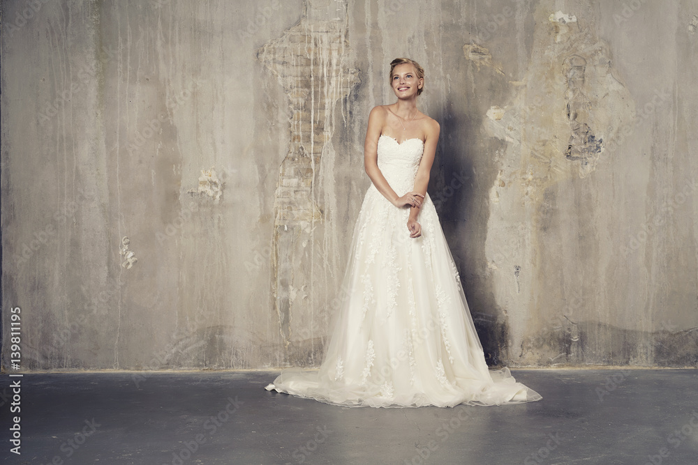 Stunning bride in studio, smiling