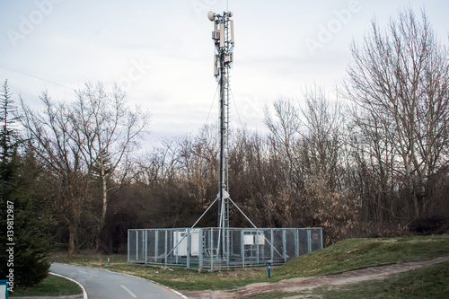 Telecommunication mast TV antennas wireless technology with blue sky in the morning