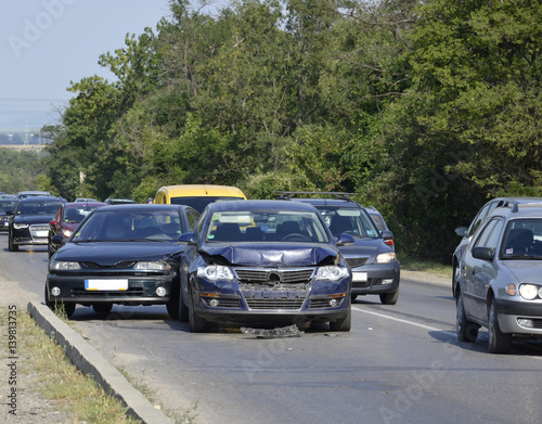 Car accident involving two cars on the road © zefart