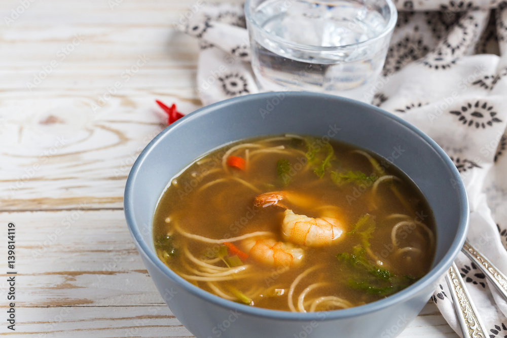 Simple Thai soup with shrimp, lemongrass, chilli and noodles Simple Thai soup with shrimp, lemongrass, chilli and noodles