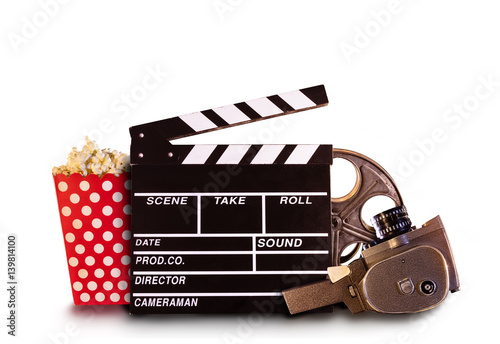 Retro film production accessories on white background