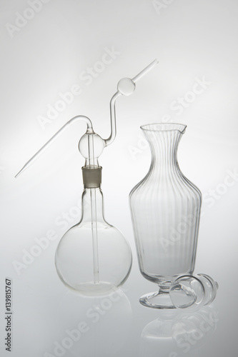 Still life of transparent crystal ampoules or glass bottles.