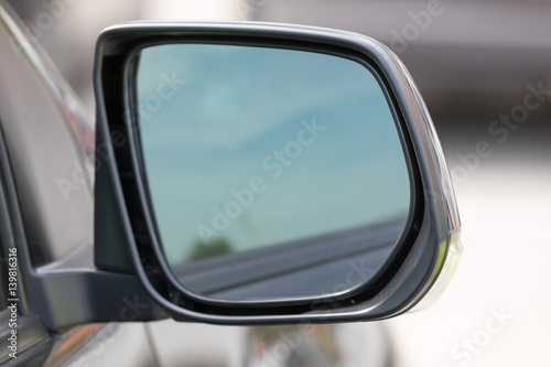 Rear view mirror close-up on car