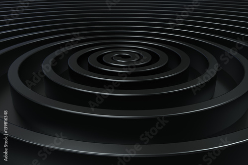 Dark concentric spiral on black background