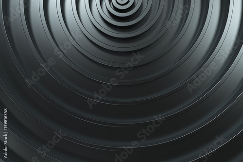 Dark concentric spiral on black background