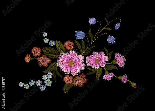 Delicate pink rose and buds on a black background