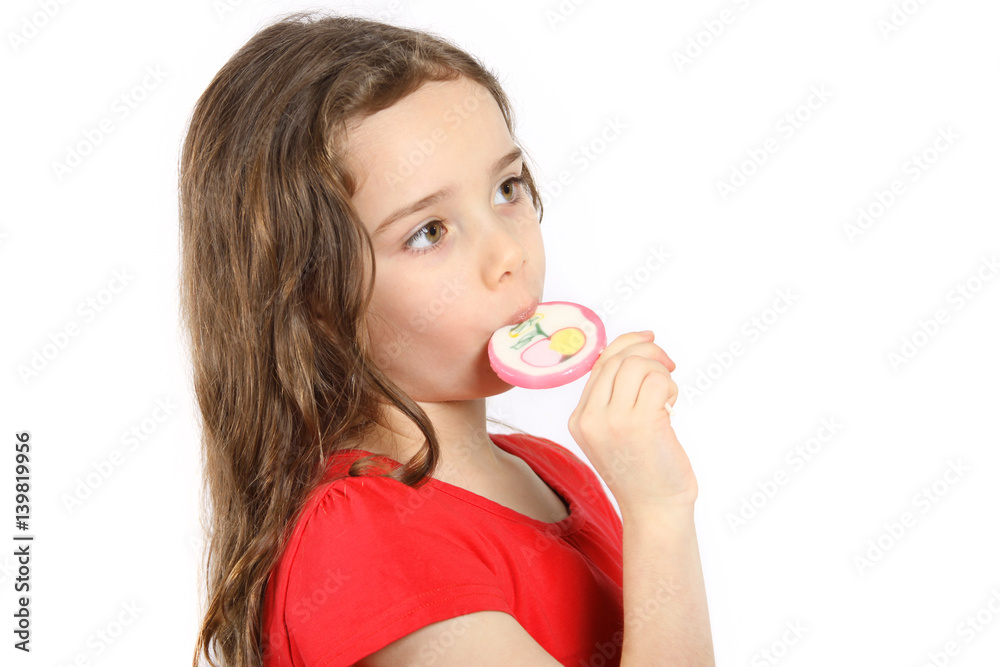 Ein Mädchen nascht einen Lutscher Ein Mädchen nascht einen Lutscher