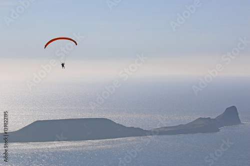 Paraglider flying at Rhossili