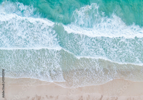 Aerial view. Top view.amazing nature background.The color of the water and beautifully bright.Azure beach with rocky mountains and clear water of Thailand ocean at sunny day.