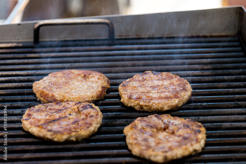 Grilled meat / pork burgers, grill, smoke and light aroma - Cooking grill burgers process Grilled meat / pork burgers, grill, smoke and light aroma - Cooking grill burgers process