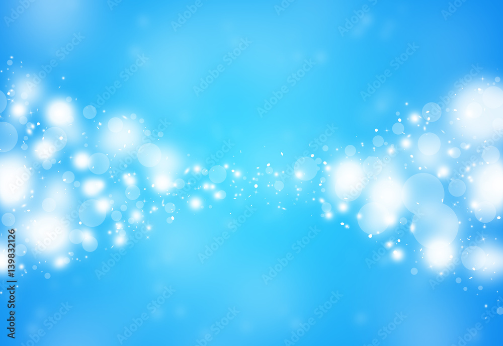 Blue sparkles glitter defocused rays lights bokeh abstract holiday background.
