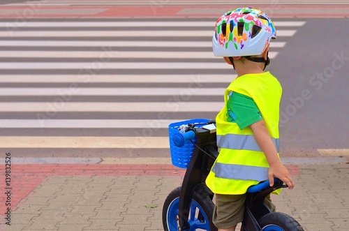 Foto Child in front of zebra crossing