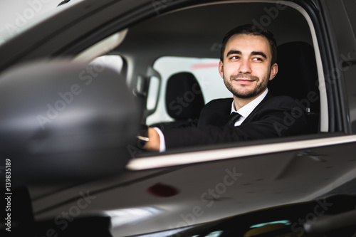 Smiling man looking from a car window © F8  \ Suport Ukraine