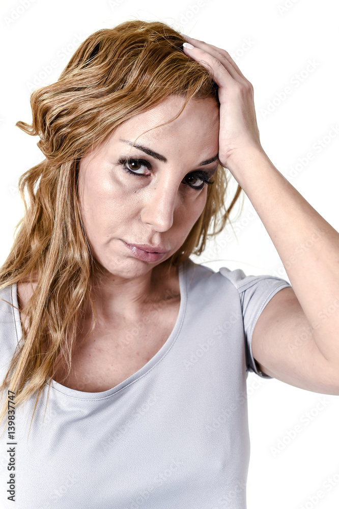 depressed woman looking desperate in pain face expression suffering migraine and headache