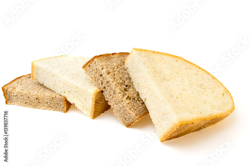 Pieces of white bread and black rye bread