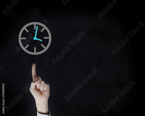 finger on the black background and the watch icon